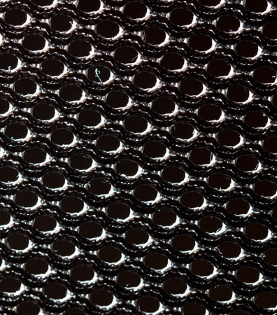 Black fabric in a hole as an abstract background. texture.の写真素材