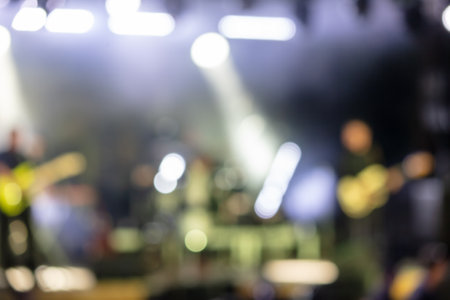 Bokeh from a concert of yellow-green light.の写真素材