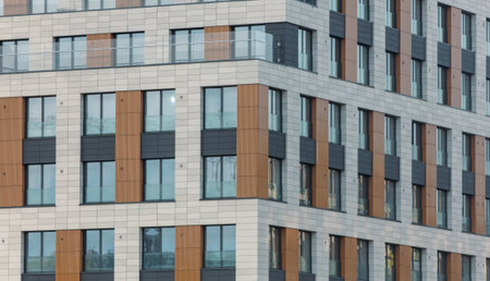 The walls of a multi-story building as a background. Texture.