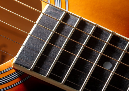 Strings on an acoustic guitar. close-up.