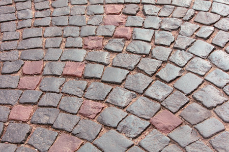 Stone pavement on the sidewalk as an abstract background. Texture.の写真素材