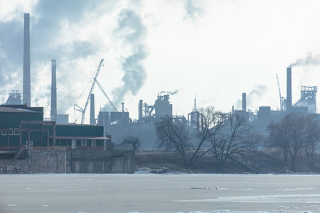 Smoke from the chimneys of a metallurgical plant in nature.の写真素材