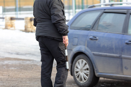 Traffic inspector on the road in winter.の写真素材