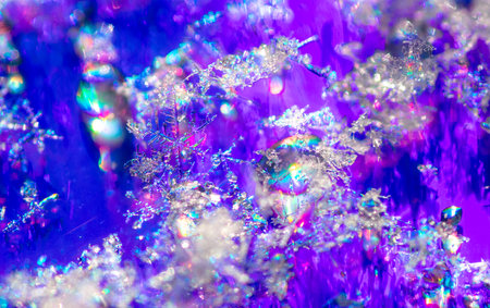 Close-up of snowflakes on a blue background. Macro.