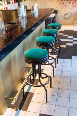 The chairs are at the bar counter.の写真素材