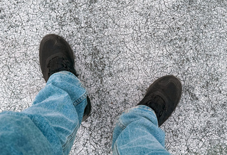 Male legs in shoes on the road.の写真素材