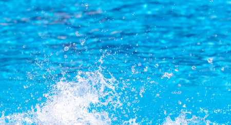 Splashes of water from a fountain as an abstract background.