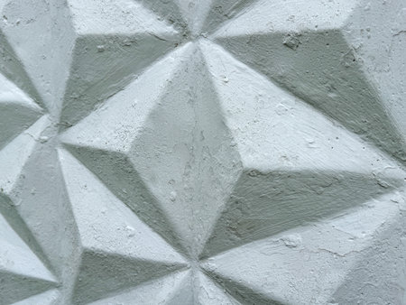 Patterned white concrete fence as background. Texture.の写真素材