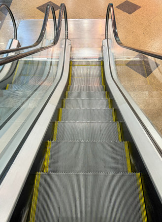 Supermarket escalator steps as background.
