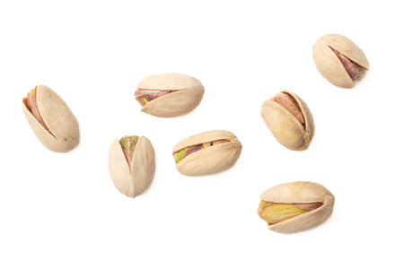 Fresh pistachios isolated on white background. Macro.の写真素材