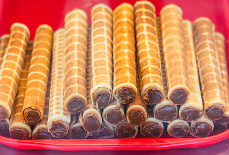 Wafer rolls filled with caramel.の写真素材