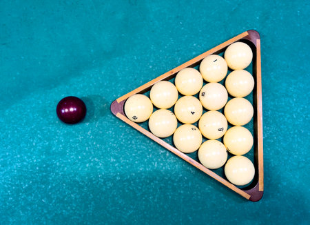 Close-up of balls on a billiard table.