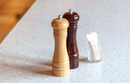 Salt and pepper on the table in a cafe. Close-up.の写真素材