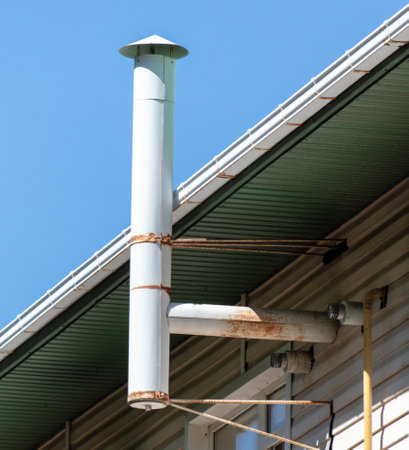 Ventilation pipe on the roof of a house.