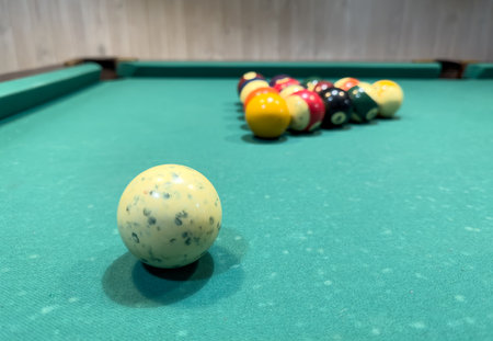 Close-up of balls on a billiard table.