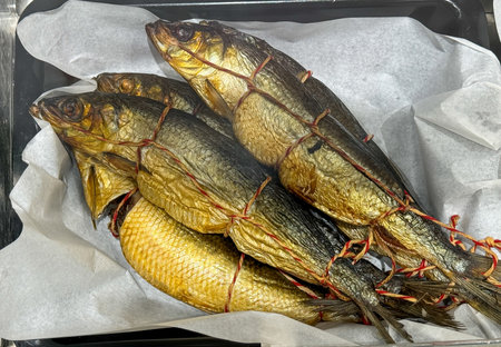Close-up of smoked fish in the market.