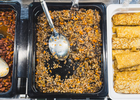 Mushroom dishes on display in a market.の写真素材