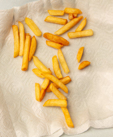 French fries on a paper towel. Close-up.の写真素材