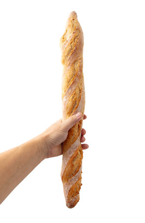 Baguette bread in hand isolated on white background.の写真素材