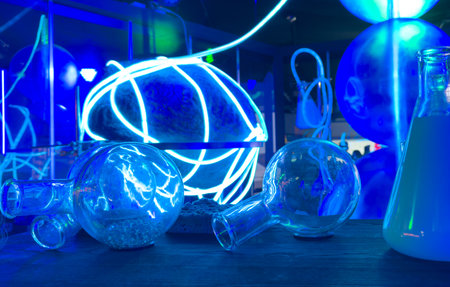 Chemistry flasks in blue light.の写真素材