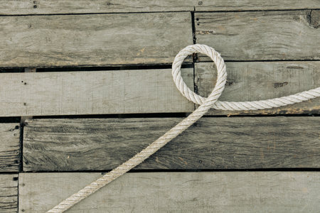 Rope on a wooden background.