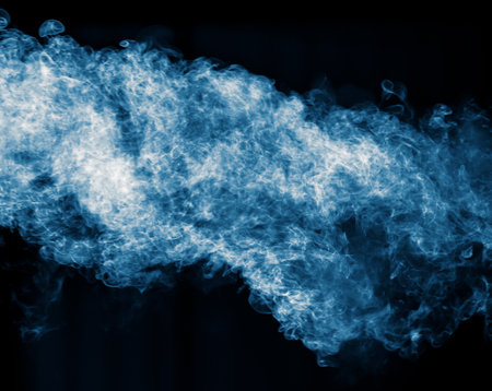 Blue smoke isolated black background.の写真素材