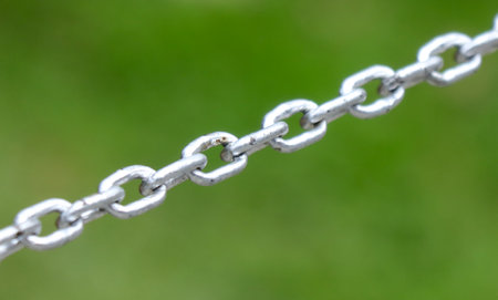 Metal chain in nature. Background.の写真素材