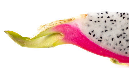Dragon fruit in a section isolated on a white background.の写真素材