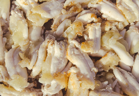 Fried squids in batter. Close-up.