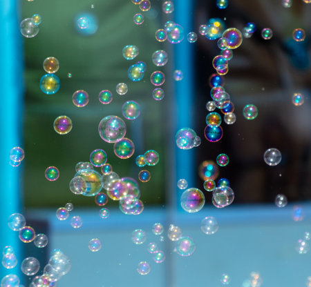 Soap bubbles fly as an abstract backgroundの写真素材