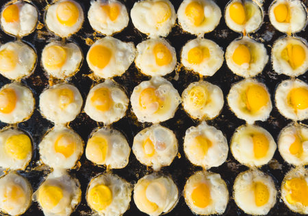 Fried eggs on the counter. Street food of Thailand.の写真素材