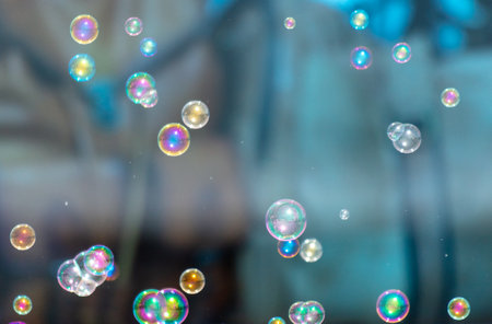 Soap bubbles fly as an abstract backgroundの写真素材