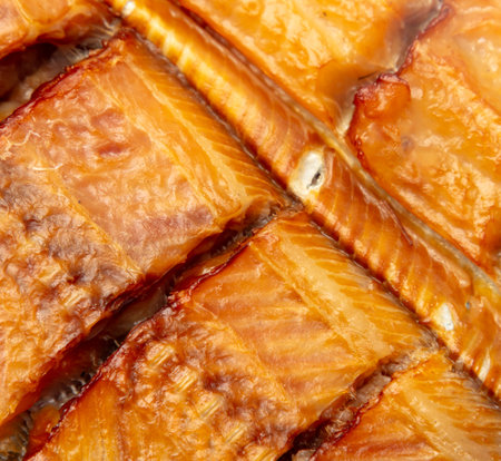 Close-up of smoked fish as a background.の写真素材