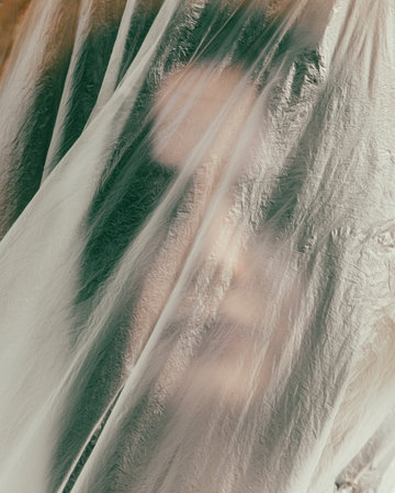 Portrait of a girl in a plastic bag.