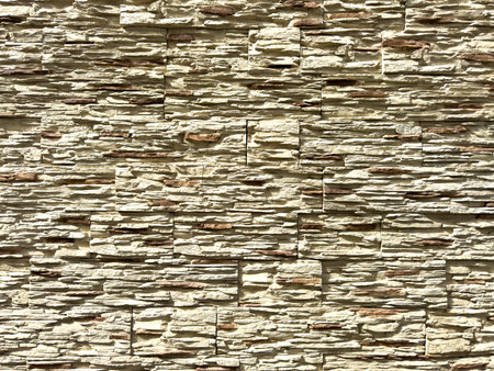 Wall of stone bricks as an abstract background. Texture.