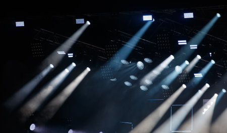 Blue light at a concert. Abstract background.