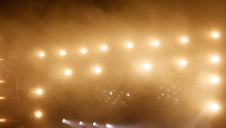 Light from spotlights on stage. Background.