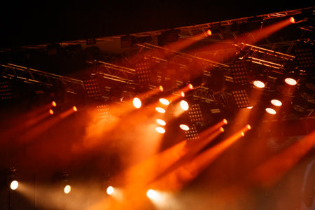 Red-orange color on stage at a concert.の写真素材