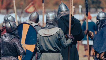 Knights in armor with weapons at war.の写真素材