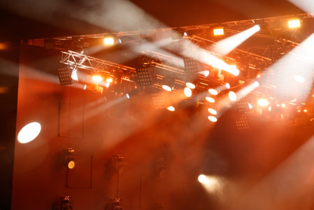 Red-orange color on stage at a concert.