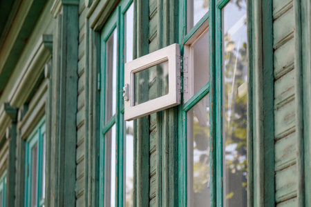 A window with a white frame and a glass window