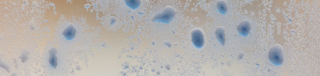 Frost patterns on window glass. Cold winter background.