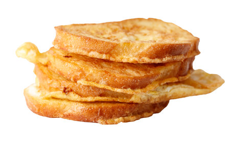 A stack of fried bread with a white background. The bread is golden brown and crispy. The stack is...