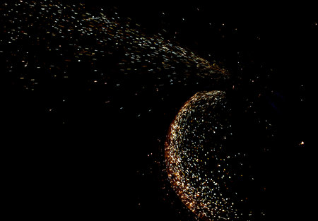 A black and white image of a galaxy with a lot of stars. The stars are scattered all over the image, creating a sense of depth and movement.の写真素材