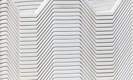 A white object with many white lines on it. The lines are in a zigzag patternの写真素材