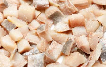 A pile of fish with a lot of bones. The fish are cut into small piecesの写真素材