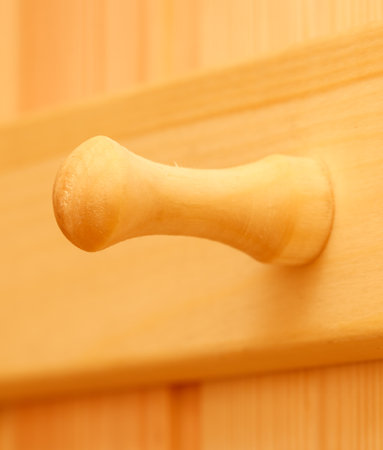 Wooden hook on a wooden board.の写真素材