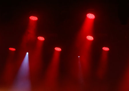 The lights are glowing red and they are shining brightly on the ceiling. The lights are on and they...