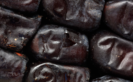 Dried dates as a background. Close-up.の写真素材