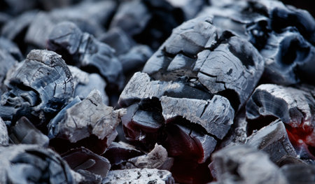 Close-up of burning charcoal as background.の写真素材